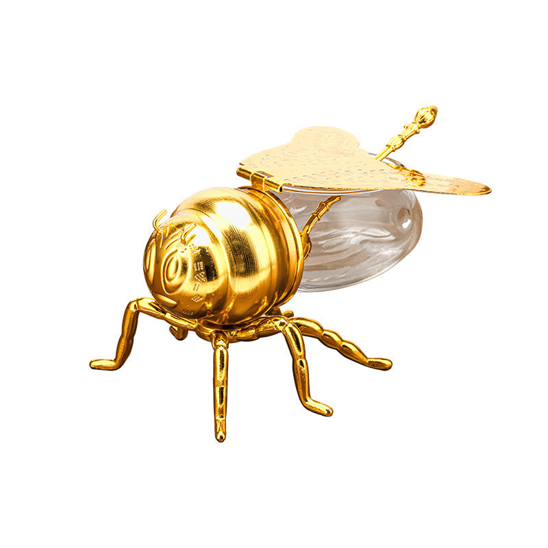 Honigglas in Bienenform als Symbol für Struktur und Zusammenhalt